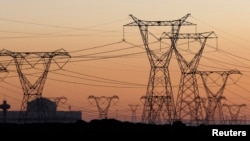 Electricity pylons carrying power for businesses and households.