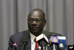 FILE - South Sudanese Information Minister Michael Makuei is seen at a press conference in Addis Ababa, Ethiopia, Jan. 5, 2014.