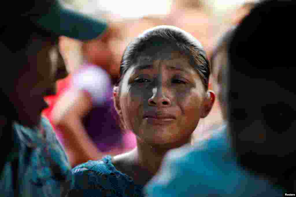 Claudia Maquin, mother of Jakelin Caal, 7, cries during her daughter&#39;s funeral at her home village of San Antonio Secortez, in Guatemala, Dec. 25, 2018. Jakelin handed herself in to U.S. border agents earlier this month and died after developing a high fever while in the custody of U.S. Customs and Border Protection.