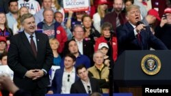 FILE - U.S. President Donald Trump speaks in support of Republican congressional candidate Rick Saccone during a Make America Great Again rally in Moon Township, Pennsylvania, March 10, 2018. 