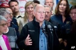 California Gov. Jerry Brown discusses the Thomas Fire and the extended length of the state's fire season during a press conference Dec. 9, 2017, in Ventura, Calif.