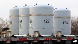In this March 6, 2014, file photo, empty nuclear waste shipping containers sit in front of the Waste Isolation Pilot Plant near Carlsbad, N.M. (AP Photo/Susan Montoya Bryan, File)
