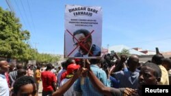 FILE - Protesters demonstrate against Somalia's President Mohamed Abdullahi Mohamed on the streets of Yaqshid district of Mogadishu, Somalia, April 25, 2021 