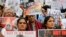Participants hold placards during a protest against a spate of violent attacks across the country targeting the country's Muslim minority, in Bangalore, India, June 28, 2017. 