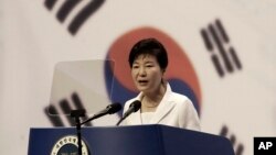 South Korean President Park Geun-hye delivers a speech during a ceremony to celebrate Korean Liberation Day from Japanese colonial rule in 1945, at Seong Cultural Center in Seoul, South Korea, Aug. 15, 2015.