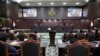 Hakim membuka sidang pertama gugatan pilpres 2024 yang diajukan oleh capres Ganjar Pranowo dan Mahfud MD, di Mahkamah Konstitusi, Jakarta, Rabu, 27 Maret 2024. (Foto: Achmad Ibrahim/AP Photo)