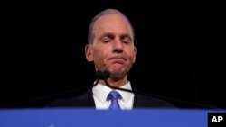 FILE - Boeing CEO Dennis Muilenburg speaks during a news conference after the company's annual shareholders meeting at the Field Museum in Chicago, Illinois, April 29, 2019.