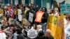 Activists protest in a demonstration at the COP29 U.N. Climate Summit on Nov. 16, 2024, in Baku, Azerbaijan.