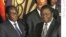 PM Morgan Tsvangirai (L) and President Robert Mugabe (R) are pictured at Zimbabwe International Investment Conference in Harare, 09 Jul 2009 