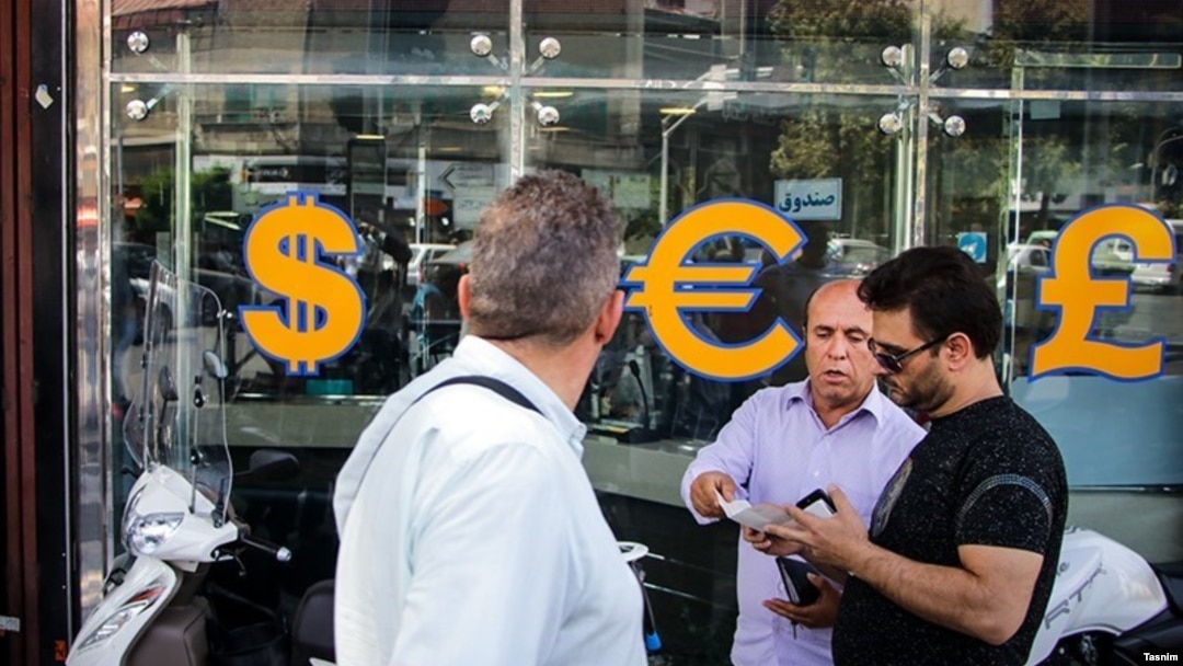  An Iranian currency exchange shop appears in this photo published, Sept. 4, 2018, by Iran's Tasnim news agency, in a report about one of Tehran's main currency exchange streets. 
