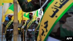 Irak'taki Hizbullah Tugayları örgütü üyeleri.