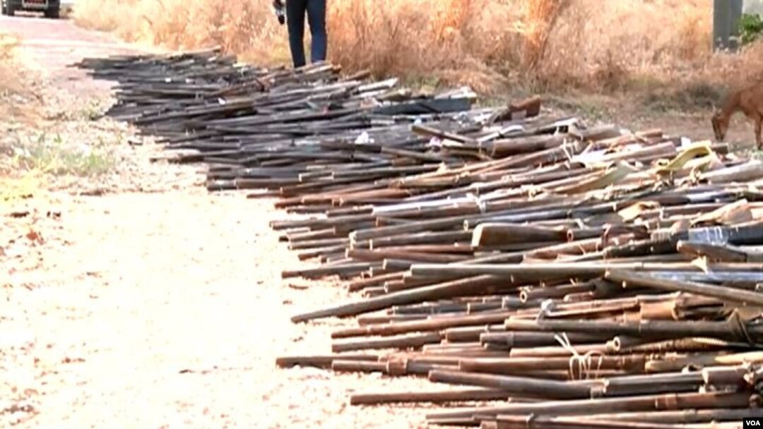 Weapons seized from suspected terrorists, high way robbers and poachers are displayed in Garoua, Cameroon, Dec. 15, 2019. (Moki Edwin Kindzeka/VOA)