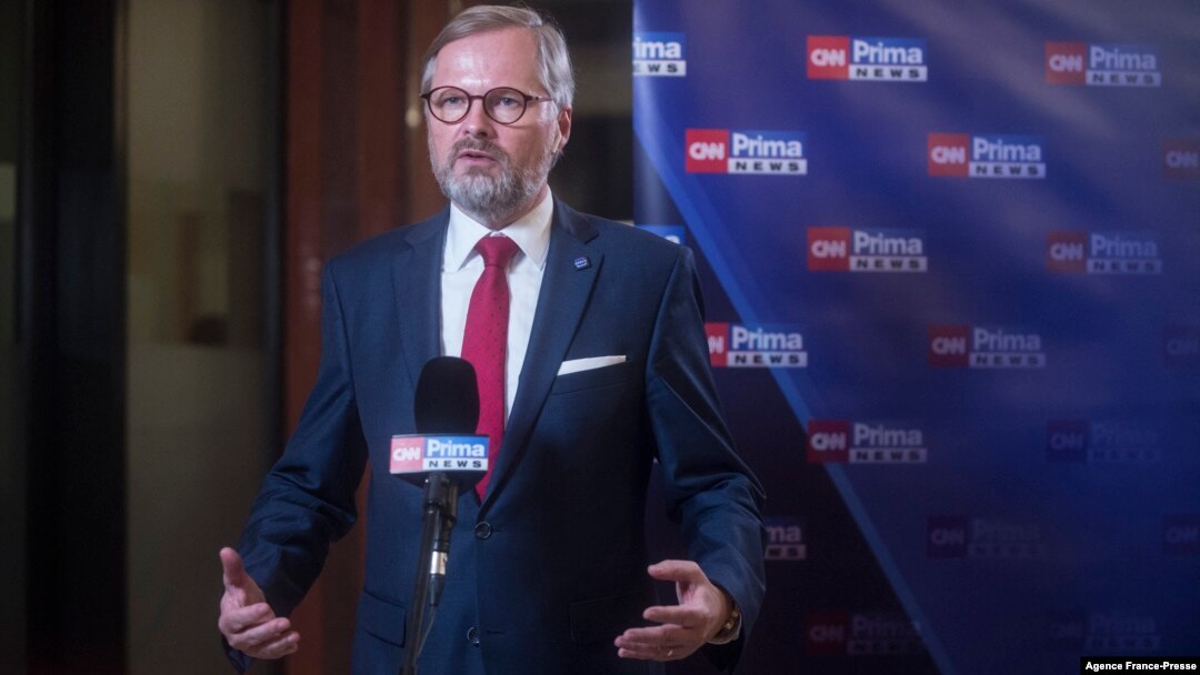 FILE - In this Oct. 9, 2021, photo, leader of Czech Republic's Civic Democratic Party Petr Fiala gives an interview after the parliamentary elections in Prague, Czech Republic.