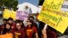 Immigration activists with Coalition for Humane Immigrant Rights of Los Angeles (CHIRLA) demand the Mexican government take more measures to protect and respect the rights of unaccompanied minors and families crossing Mexico's territory, during a protest 