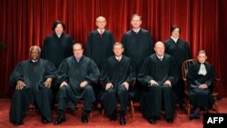 The Justices of the US Supreme Court sit for their official photograph on October 8, 2010 at the Supreme Court in Washington, DC, October 8, 2010.