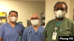 Phung Vo, left, with two co-workers at EvergreenHealth Medical Center in Kirkland, Washington. (Photo courtesy Phung Vo)