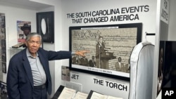 FILE - South Carolina civil rights photographer Cecil Williams shows a photograph he took of Thurgood Marshall at his museum, the only civil rights museum in the state, December 12, 2023, in Orangeburg, South Carolina. 