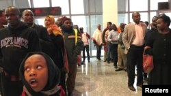 Passengers queue to purchase tickets for the Standard Gauge Railway line constructed by the China Roads and Bridges Corp. and financed by Chinese government at the Nairobi Terminus in the outskirts Nairobi, Kenya, July 28, 2017.