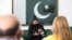FILE - Pakistan's Interior Minister Sheikh Rashid Ahmed speaks to reporters at the Pakistani embassy in Kuwait City, May 31, 2021.