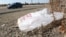 Plastic shopping bag litters roadside, Sacramento, Calif., Oct. 25, 2013.