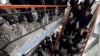 FILE - This Oct. 5, 2011, photo shows students at Pyongyang University of Science and Technology. According to the chancellor of the school, North Korea has detained a U.S. citizen who taught at the school, Tony Kim, who also goes by his Korean name who also goes by his Korean name Kim Sang-duk.