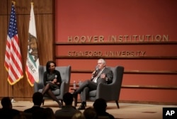 Secretary of State Rex Tillerson, right, and former Secretary of State Condoleeza Rice speak to the Hoover Institution at Stanford University in Stanford, Calif., Wednesday, Jan. 17, 2018.