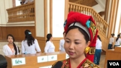 Ethnic Palaung lawmaker speaking to reporters after historic presidential vote in Myanmar's parliament, March 15, 2016. (S. Herman/VOA)