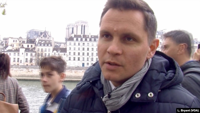 Nicolas Chouin believes Notre Dame's fire may help heal a fractured France. (L. Bryant/VOA)