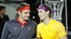 Nadal, Federer Melaju ke Perempat Final Qatar Terbuka