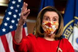 FILE - House Speaker Nancy Pelosi of California speaks during a news conference at the Capitol, Feb. 11, 2021.