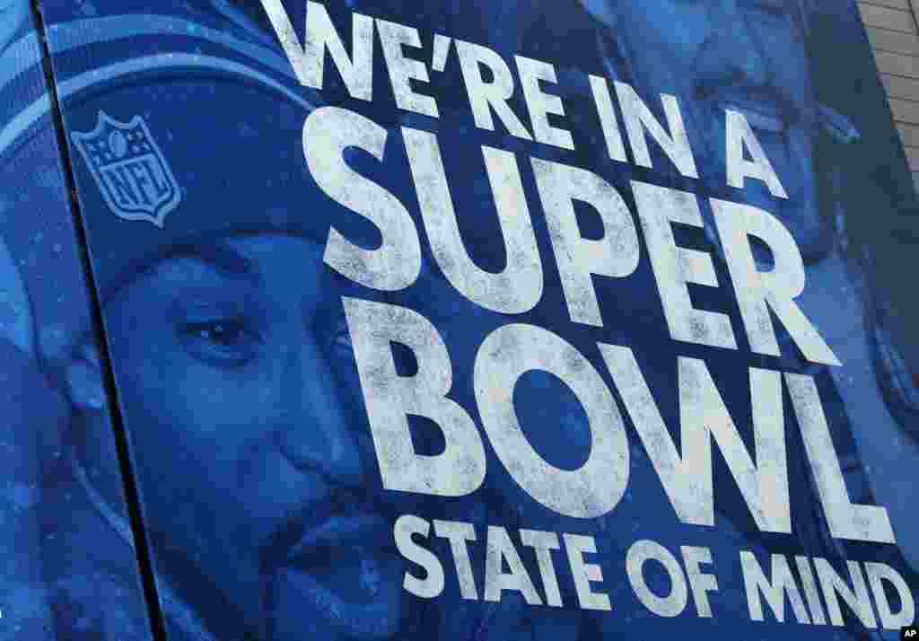 A billboard is displayed along Super Bowl Boulevard in Times Square in New York, Jan. 31, 2014.