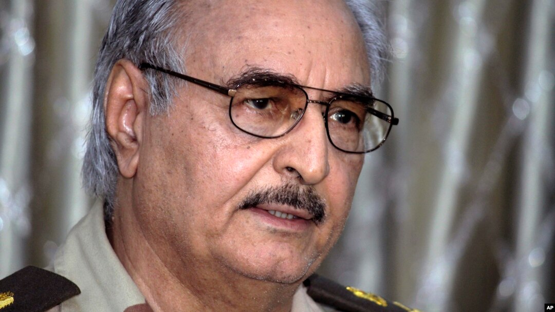 FILE - Libyan ex-General Khalifa Haftar addresses a press conference in Benghazi, Libya, May 17, 2014. 