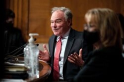 Sen. Tim Kaine, D-Va., speaks during a hearing with the Senate Health, Education, Labor, and Pensions committee to examine the nomination of Miguel A. Cardona, of Connecticut, to be Secretary of Education on Capitol Hill in Washington, Feb. 3, 2021.