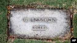 A grave marker for an unknown soldier from the Korean War is shown at the National Memorial Cemetery of the Pacific in Honolulu on Monday, July 30, 2018. 