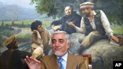 Abdullah Abdullah, a key candidate in Afghanistan's upcoming presidential election, speaks during an interview at his home, in Kabul, Afghanistan, Sept. 26, 2019. 