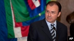 FILE - Mexico's Finance Minister Luis Videgaray Caso gives a press conference at the National Palace in Mexico City.