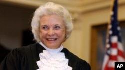 FILE - Supreme Court Justice Sandra Day O'Connor is shown before administering the oath of office to members of the Texas Supreme Court in Austin, Texas, on Jan. 6, 2003.