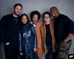 FILE - Armie Hammer, from left, Tessa Thompson, director Boots Riley, Steven Yeun and Terry Crews pose for a portrait to promote the film, "Sorry to Bother You," during the Sundance Film Festival in Park City, Utah, Jan. 21, 2018.