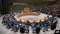 FILE - Members of the U.N. Security Council discuss the situation in North Korea, at United Nations headquarters, in New York, Dec. 15, 2017.