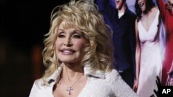 Dolly Parton arrives at the Los Angelespremiere of her movie "Joyful Noise" 
