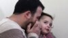 Syrian Father Teaches Daughter to Laugh when Bombs Fall