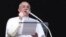 FILE - Pope Francis delivers his Sunday Angelus prayer in Saint Peter's Square at the Vatican, Feb. 1 2015. 