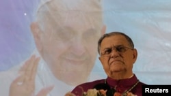 Latin Patriarch of Jerusalem Fouad Twal, the top Roman Catholic cleric in the Holy Land, pauses during a news conference in the northern city of Haifa, May 11, 2014.