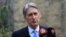 FILE - Philip Hammond, then the British foreign secretary, speaks at a press conference at the British embassy in Baghdad, Iraq, March 16, 2016.