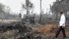 Presiden Jokowi saat meninjau lokasi kebakaran hutan di Pelalawan, Riau, 17 September 2019.