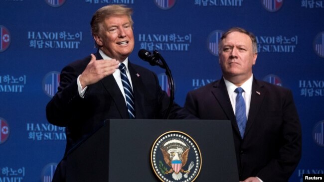 FILE - U.S. President Donald Trump accompanied by U.S. Secretary of State Mike Pompeo speaks at a news conference, following talks with North Korean leader Kim Jong Un in Hanoi, Vietnam, Feb. 28, 2019.