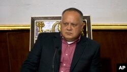 In this April 2, 2019 file photo, Diosdado Cabello, Venezuela's socialist party boss and president of the National Constituent Assembly attends a session in Caracas, Venezuela.