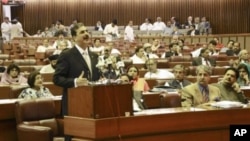 In this photo released by Pakistan's Press Information Department, Pakistani Prime Minister Yousuf Raza Gilani delivers a speech at the parliament house in Islamabad, Pakistan, May 9, 2011
