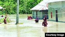 বাংলাদেশে বন্যা কবলিত একটি এলাকা।