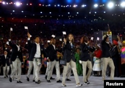 The refugee Olympic team arrives at the Opening Ceremony of the Rio Olympics.